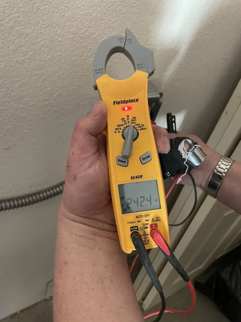 Voltage testing with clamp meter during Electrical Installation Services in Byron